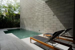 La alberca dentro o cerca de Oceanphere Villa by Prop Hopper