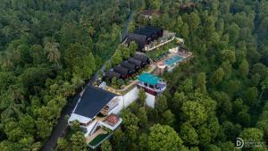 an aerial view of a house in the middle of a forest at Munduk Kupang Sekumpul Villa in Singaraja