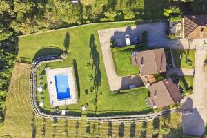 an aerial view of a house with a train yard at Viola in Colico
