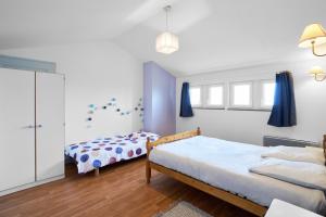 Postel nebo postele na pokoji v ubytování Gite piscine chauffée - Sauvignac + 31 fotografií