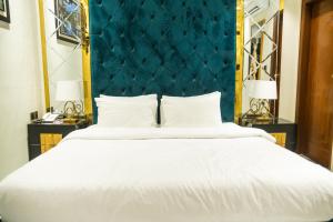 Ένα ή περισσότερα κρεβάτια σε δωμάτιο στο Hotel One +16 φωτογραφίες