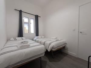 Postel nebo postele na pokoji v ubytování Sunset Cottage