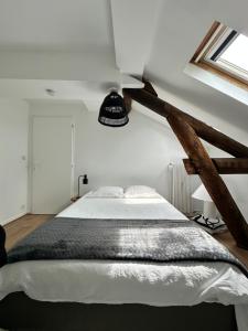 Postel nebo postele na pokoji v ubytování Le havre Isabey - Appartement coquet et calme