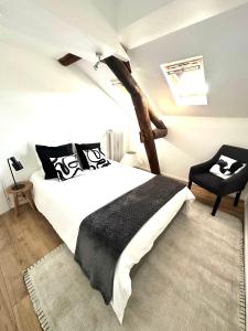 Postel nebo postele na pokoji v ubytování Le havre Isabey - Appartement coquet et calme