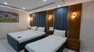 Ένα ή περισσότερα κρεβάτια σε δωμάτιο στο Hotel One