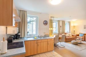 Kuchyň nebo kuchyňský kout v ubytování Haus am Buchenpark 11