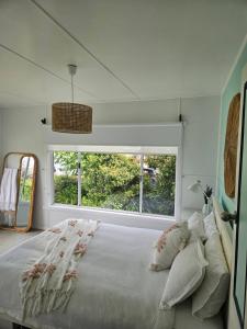 Postel nebo postele na pokoji v ubytování Port Sorell Beach Shack