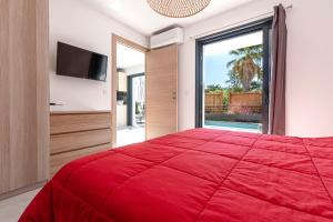 Ένα ή περισσότερα κρεβάτια σε δωμάτιο στο Villa U Veniqui 2 - Piscine privée