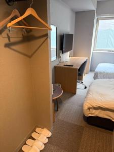 Postel nebo postele na pokoji v ubytování Hotel Tetora Spirit Sapporo - Vacation STAY 59351v