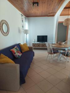 TV a/nebo společenská místnost v ubytování Marialena's houses