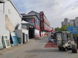 a small cart parked on the side of a street at Suhe Homestay in Nanjing