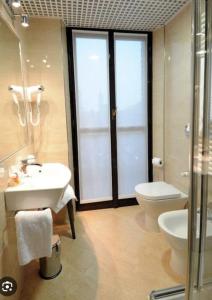 Koupelna v ubytování Nuovo Hotel Italia