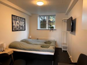 Postel nebo postele na pokoji v ubytování Jysk bed and no breakfast + 5 fotografií