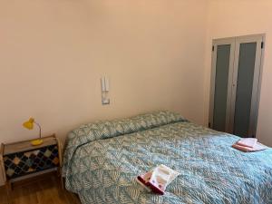 Ένα ή περισσότερα κρεβάτια σε δωμάτιο στο Vacation Home in Lamezia Centro