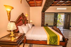 Postel nebo postele na pokoji v ubytování Clifinn Wellness Beach Resort by nutmeg + 23 fotografií