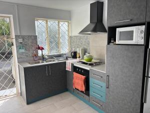 Η κουζίνα ή μικρή κουζίνα στο Villa Aquamarine by Lakaz Tropikal