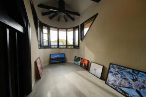 a room with paintings on the floor and a ceiling at Fuji Elegance Hotel in Yamanakako