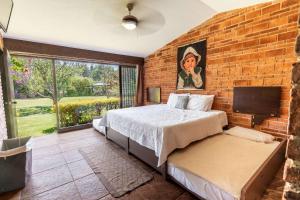 Postel nebo postele na pokoji v ubytování ANANA Casa SK Villa Garden & Family-Friendly