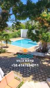 Bazén v ubytování Posada Villa Mayo Apartamento7 familiar a 5 Min de Playa Parguito nebo v jeho okolí