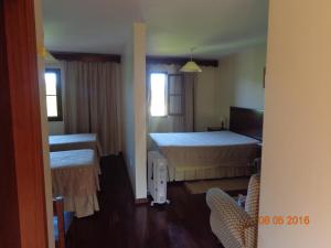 Postel nebo postele na pokoji v ubytování Quinta do Lagar