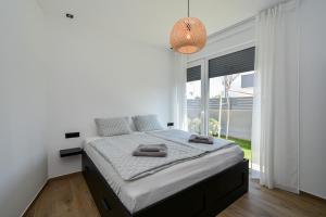 Postel nebo postele na pokoji v ubytování Villa EnDi in Medulin, Istria by Istrabook + 38 fotografií