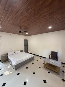 Postel nebo postele na pokoji v ubytování The Dreams of Kathiyawad