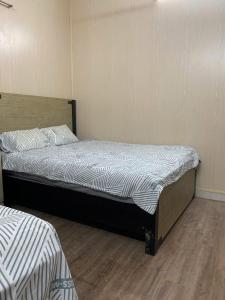 a bedroom with a bed in a room at LushStay Cao Bá Quát in Hanoi