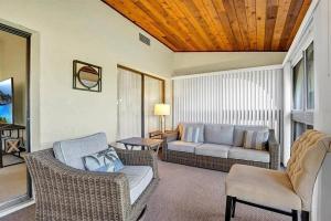 a living room with a couch and chairs at Perfect blend of comfort Lake Wales in Lake Wales