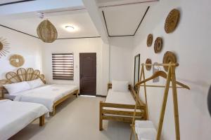 En eller flere senge i et værelse på Salacia Beachfront Resort managed by MA Group