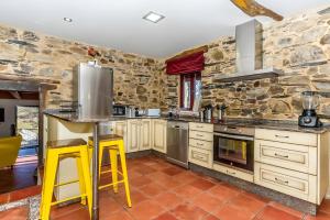 Η κουζίνα ή μικρή κουζίνα στο Casa Rural Ucedo