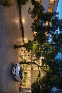 a car parked on the side of a building at Time Square Boutique Hotel & Spa in Alleppey