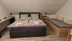 Postel nebo postele na pokoji v ubytování FeWo Langewerth