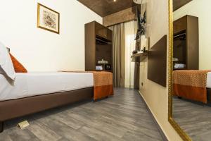 Postel nebo postele na pokoji v ubytování Vaticano Julia Guest House