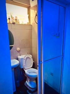 Ένα μπάνιο στο Cozy 1 Bedroom Apartment Ikeja GRA