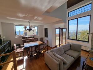 Posezení v ubytování Monte horizon - By Ski Alure