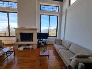 Posezení v ubytování Monte horizon - By Ski Alure