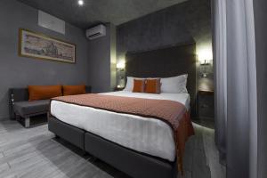 Postel nebo postele na pokoji v ubytování Vaticano Julia Guest House