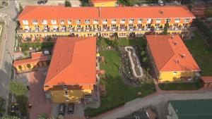 an overhead view of a building with an orange roof at Ostseepark in Zempin