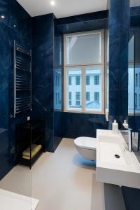 Koupelna v ubytování City Center Apartments