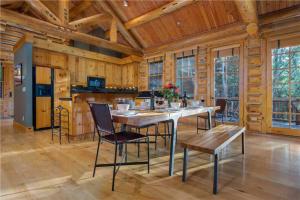 a large dining room with a table and chairs at RMR: Granite Ridge Cabin 7586 in Teton Village in Teton Village +23 photos