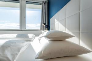 Postel nebo postele na pokoji v ubytování Vienna Skyline Apartment