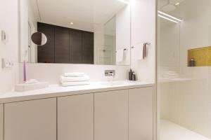 Koupelna v ubytování Vienna Skyline Apartment + 26 fotografií