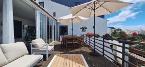 En balkon eller terrasse på Villa Lagoa Family - Premium Location + 42 billeder