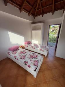 Postel nebo postele na pokoji v ubytování Resort Villa Morgana