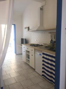 Η κουζίνα ή μικρή κουζίνα στο Agriturismo La Contadina Appartamenti +2 φωτογραφίες