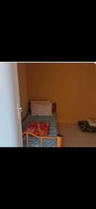 Ένα ή περισσότερα κρεβάτια σε δωμάτιο στο Pousada Rio do Mar