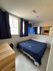 Ένα ή περισσότερα κρεβάτια σε δωμάτιο στο Maraca Hostel