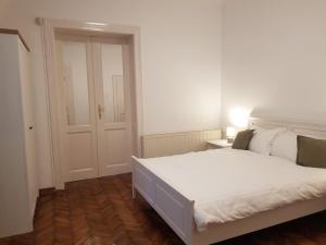 En eller flere senge i et værelse på Casa Milan