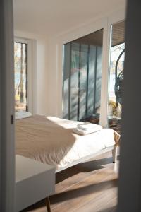 Ένα ή περισσότερα κρεβάτια σε δωμάτιο στο TerraBakota