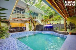 Πισίνα στο ή κοντά στο The Green Post by VEO - Part of StayVista